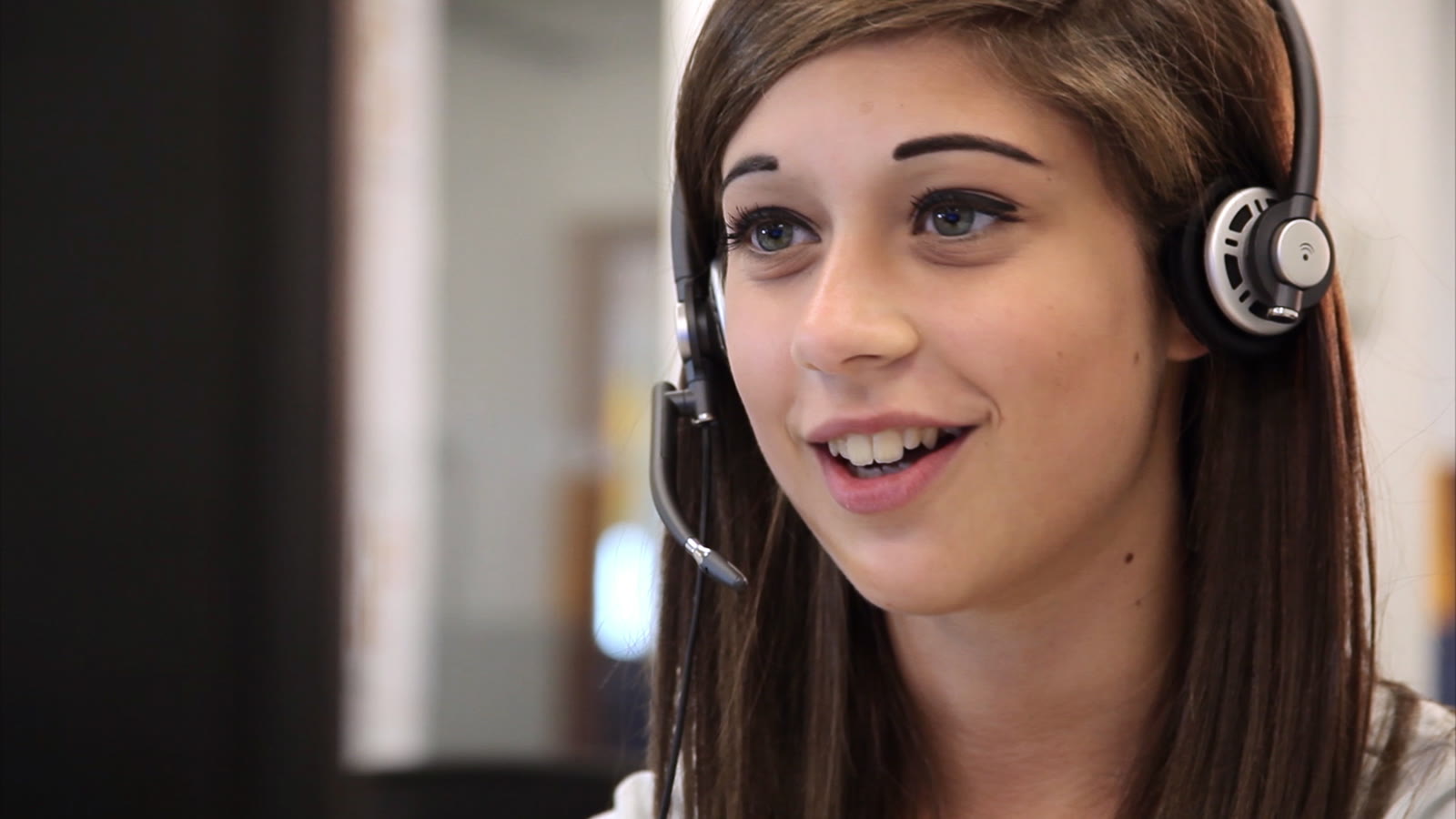 Access Prepaid: a call centre agent wearing a headset