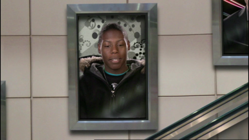 EMA: My Way, a framed portrait advert of a young man in a cap, glowing beside an animated pound coin graphic